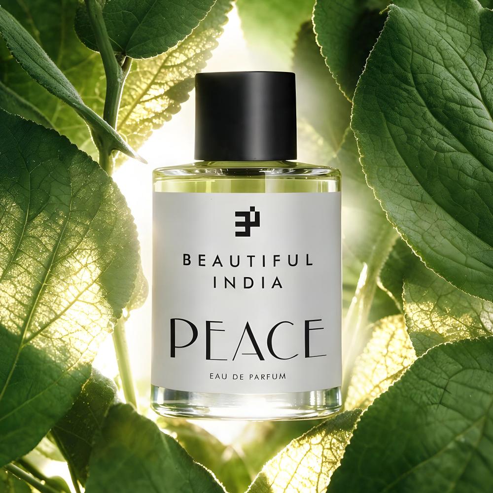 Peace Eau de Parfum among green leaves